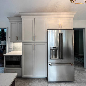 Two Tone Kitchen with Wood Stained and Light Beige Cabinets