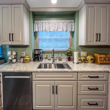 Two Tone Kitchen with Irish Creme Cabinets and Rustic Dockside Island