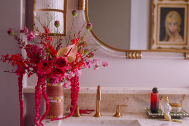 Example of a mid-century modern powder room design in Los Angeles