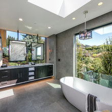 bathtub next to a window