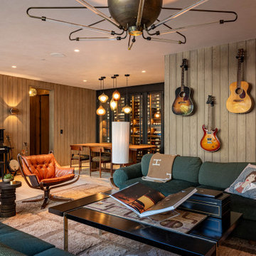 Modern Bronze Steel Wine Wall and Liquor Display in Luxury Custom Home Basement