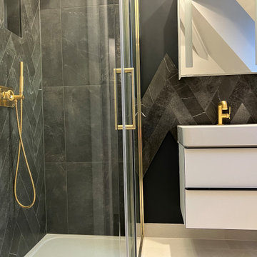 Black and gold shower room in Putney