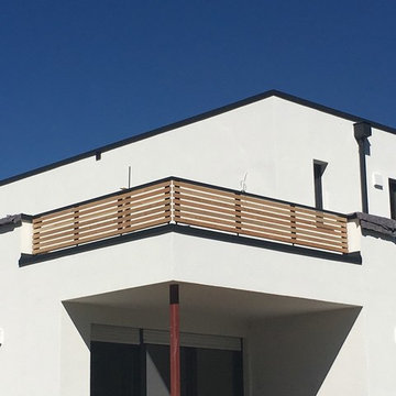 Holzgeländerverkleidung mit Rhombusprofilleisten aus Lärche