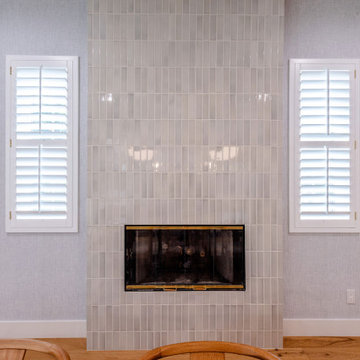 Updated fireplace with vertical stacked tile