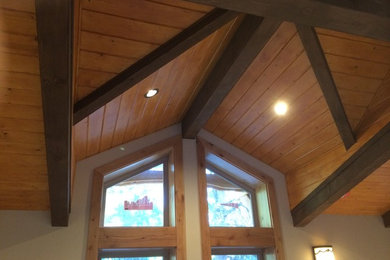 Inspiration for a mid-sized rustic front door remodel in Other with beige walls
