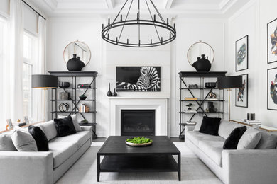 Large transitional open concept dark wood floor, brown floor, tray ceiling and wall paneling living room photo in Toronto with white walls, a standard fireplace, a stone fireplace and a wall-mounted tv