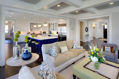 Example of a classic open concept dark wood floor living room design in DC Metro with gray walls