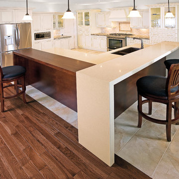 Contemporary Kitchen with Triple Height Island