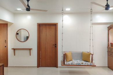 Minimalist living room photo in Mumbai