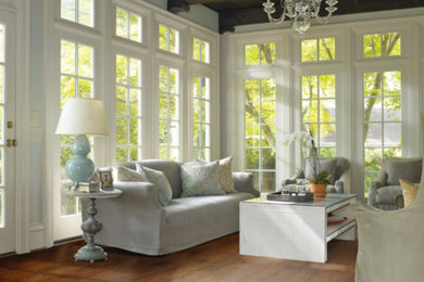 Example of a large trendy formal and enclosed dark wood floor and brown floor living room design in Other with white walls, no fireplace and no tv