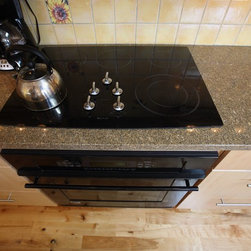 Maple Kitchen with Granite Countertops - Cooktops