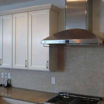 Maple cabinets finished in Ballet White