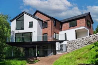 Design ideas for a modern house exterior in Other.