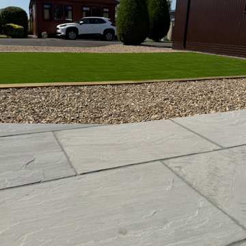 Riven Paving, Shingle Strip and Lawn Set Out in Layers