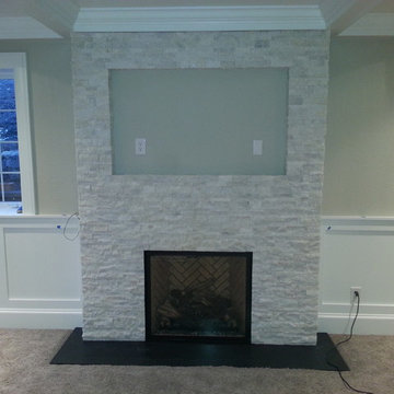 Stacked white stone fireplace