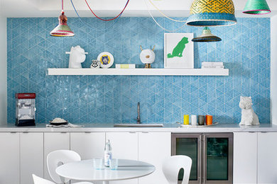 Inspiration for a contemporary kids' room in Atlanta with blue walls and grey floor.