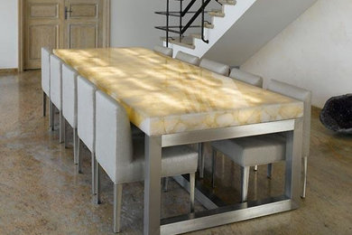 Example of a large trendy dining room design in Atlanta with white walls
