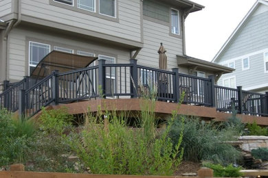 Transitional deck photo in Denver