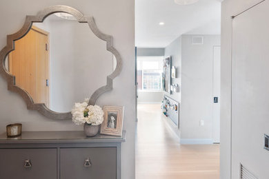 Design ideas for a transitional entryway in New York.