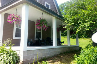 White two-story wood exterior home photo in Portland Maine