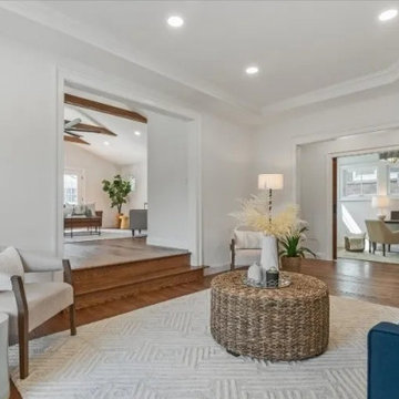 living room after, family room (left) and office (right) beyond