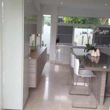 Kitchen - Grey gloss acrylic and textured grey melamine doors