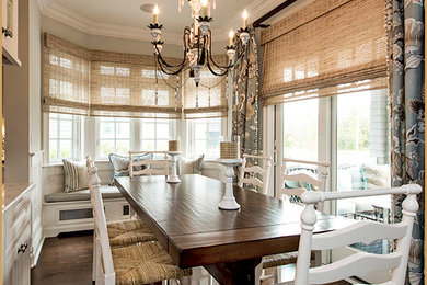 Enclosed dining room - large coastal dark wood floor and brown floor enclosed dining room idea in New York with gray walls and no fireplace