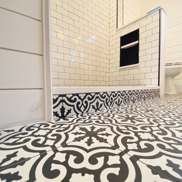 Bathroom Floor Tile, Shower Tile, Vanity, and Lighting Installation