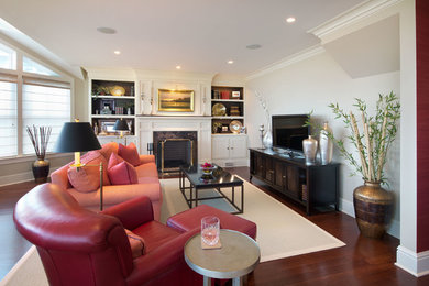 Inspiration for a large asian enclosed dark wood floor and brown floor living room remodel in New York with beige walls, a stone fireplace, a tv stand and a standard fireplace
