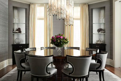 Inspiration for a mid-sized transitional dark wood floor enclosed dining room remodel in New York with gray walls
