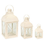 Melrose - Lantern (Set Of 3) 8.5"H, 13.75"H, 18.5"H Metal/Glass - Enhance your home's aesthetic with this rustic set of decorative lanterns. Its traditional design paired with a weathered ivory finish is the perfect combination to make a stunning piece. The sturdy metal composition is sure to last for seasons to come. Its a great addition to both every day and seasonal decor. Just add real wax or LED candles to complete the look. It also makes a great canvas for DIY faux floral arrangements.