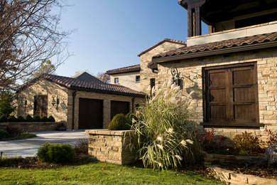 Tuscan exterior home photo in Wichita