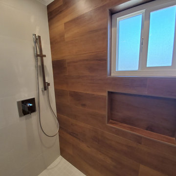 Sleek Aliso Viejo Shower Remodel with Wood-Inspired Accent Wall