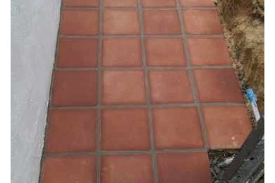 Inspiration for a mediterranean side yard brick walkway in Los Angeles.