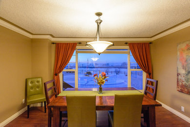 Mountain style dining room photo in Calgary