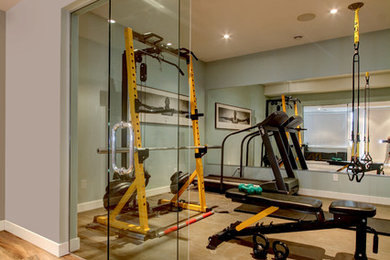 Home weight room - mid-sized contemporary cork floor home weight room idea in Edmonton with gray walls