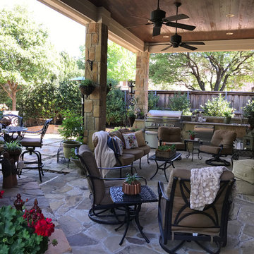 Comfortable patio with plenty of seating and plants to add colorful life