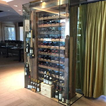 Glass cabinetry: wine closet display