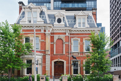 Example of an ornate exterior home design in Toronto