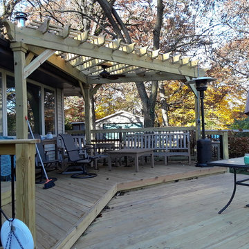 Multi-level Wood Deck with Pergola by Deck and Pergola Builder.