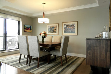 Great room - mid-sized contemporary medium tone wood floor great room idea in Toronto with gray walls