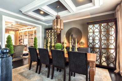 Enclosed dining room - mid-sized transitional dark wood floor enclosed dining room idea in New York with gray walls