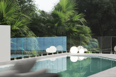 Идея дизайна: бассейн среднего размера, произвольной формы на внутреннем дворе в стиле модернизм