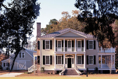 Inspiration for a mid-sized timeless two-story concrete fiberboard exterior home remodel in Charlotte