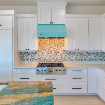 Fresh Open-Concept Kitchen With Blue Accents