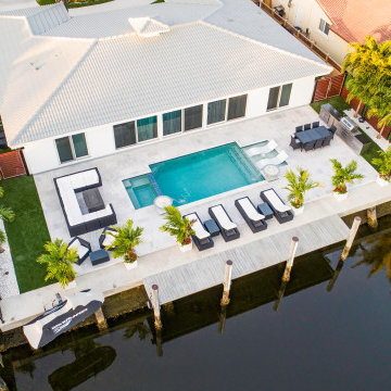 Custom Pool & Spa With Water and Fire Bowls in Pompano Beach