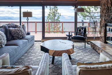 Transitional open concept living room photo in Other