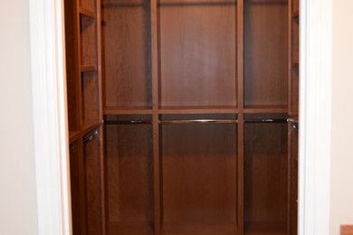 Example of a minimalist closet design in San Francisco