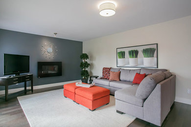 Family room - mid-sized modern enclosed dark wood floor and brown floor family room idea in Other with white walls, a ribbon fireplace, a metal fireplace and a tv stand