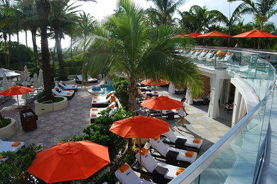 Beach style home design photo in Miami